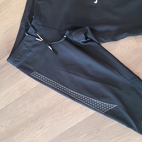 Like new Nike Black long Reflective leggings. - Picture 2 of 6